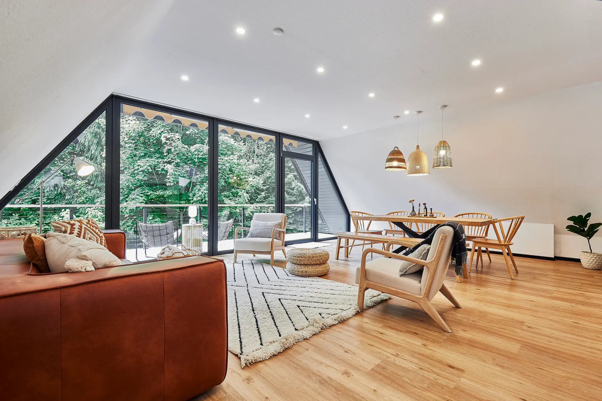 HAUS28 – Living and dining area beneath the gable window