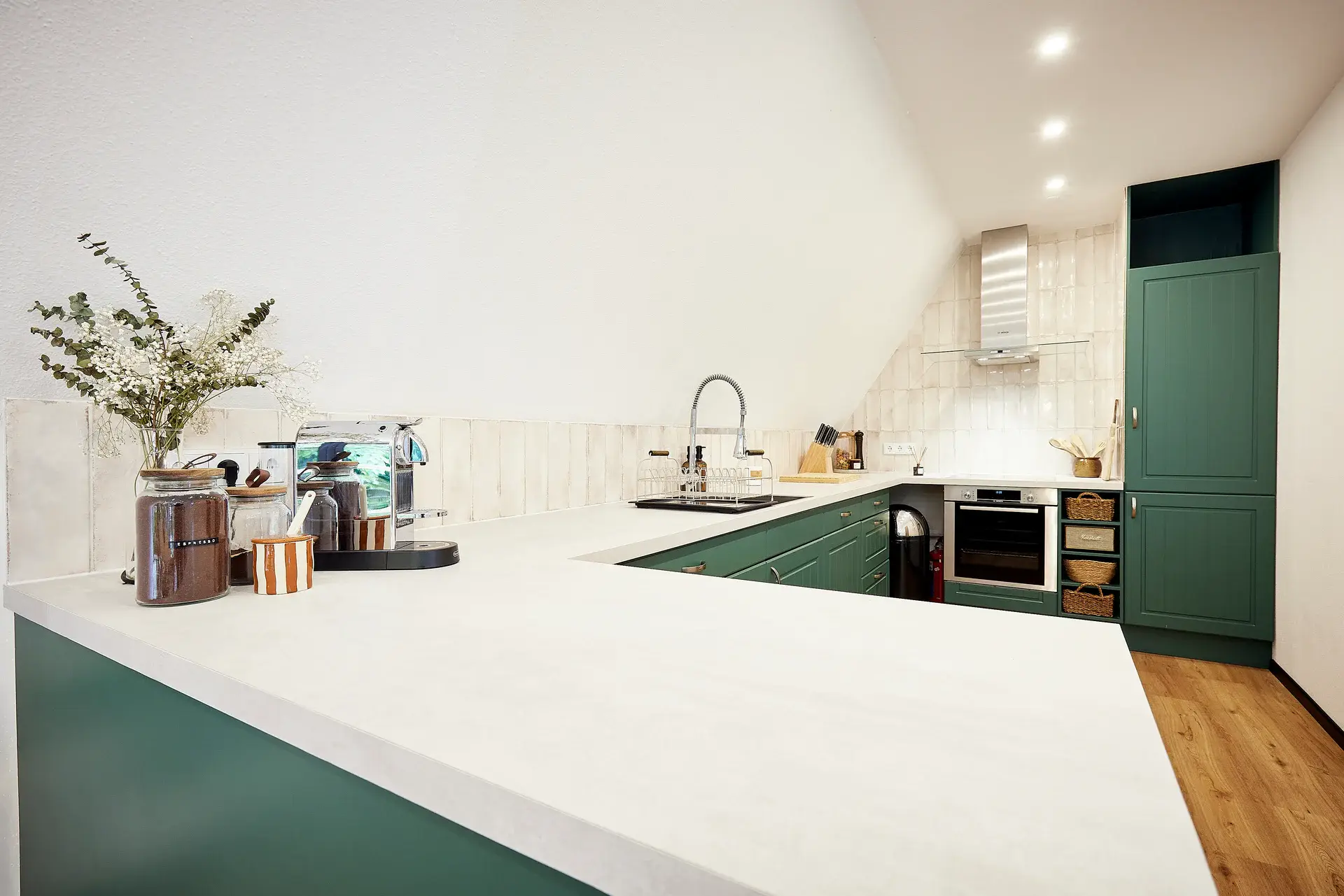 HAUS28 – Kitchen with green cabinets